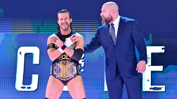 Adam Cole with Triple H