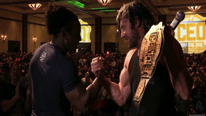 Kenny Omega and Xavier Woods