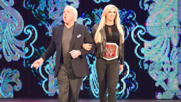 Charlotte Flair with Ric Flair. Image Credit: WWE.com