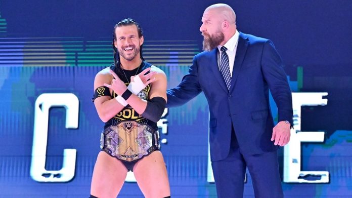 Adam Cole with Triple H