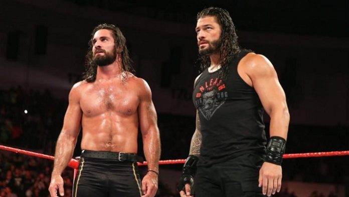 Seth Rollins with Roman Reigns