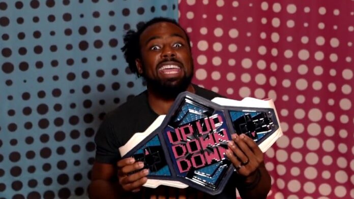 Xavier Woods with the UUDD championship