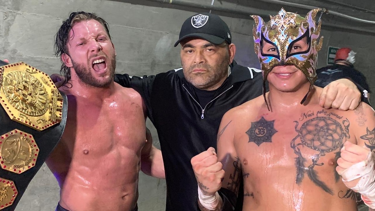 Konnan with Kenny Omega and Rey Fenix