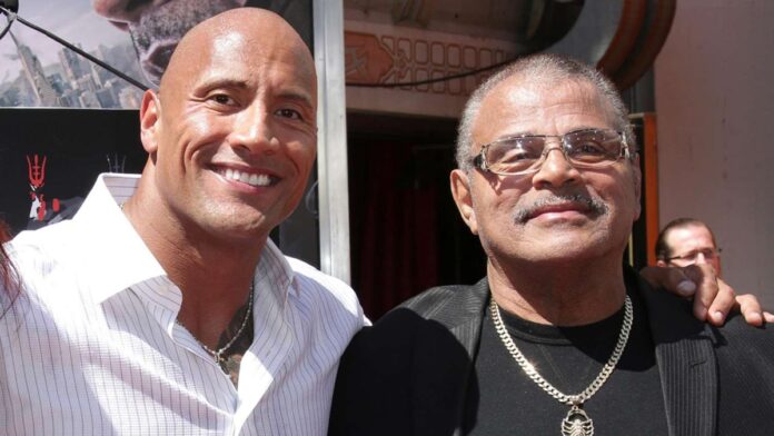 The Rock with his father Rocky Johnson